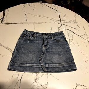 Girl’s jean miniskirt with shorts